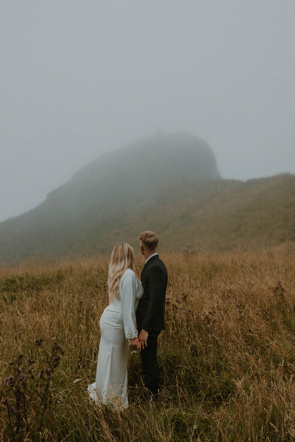 the couple looking at the Oregon elopement fog