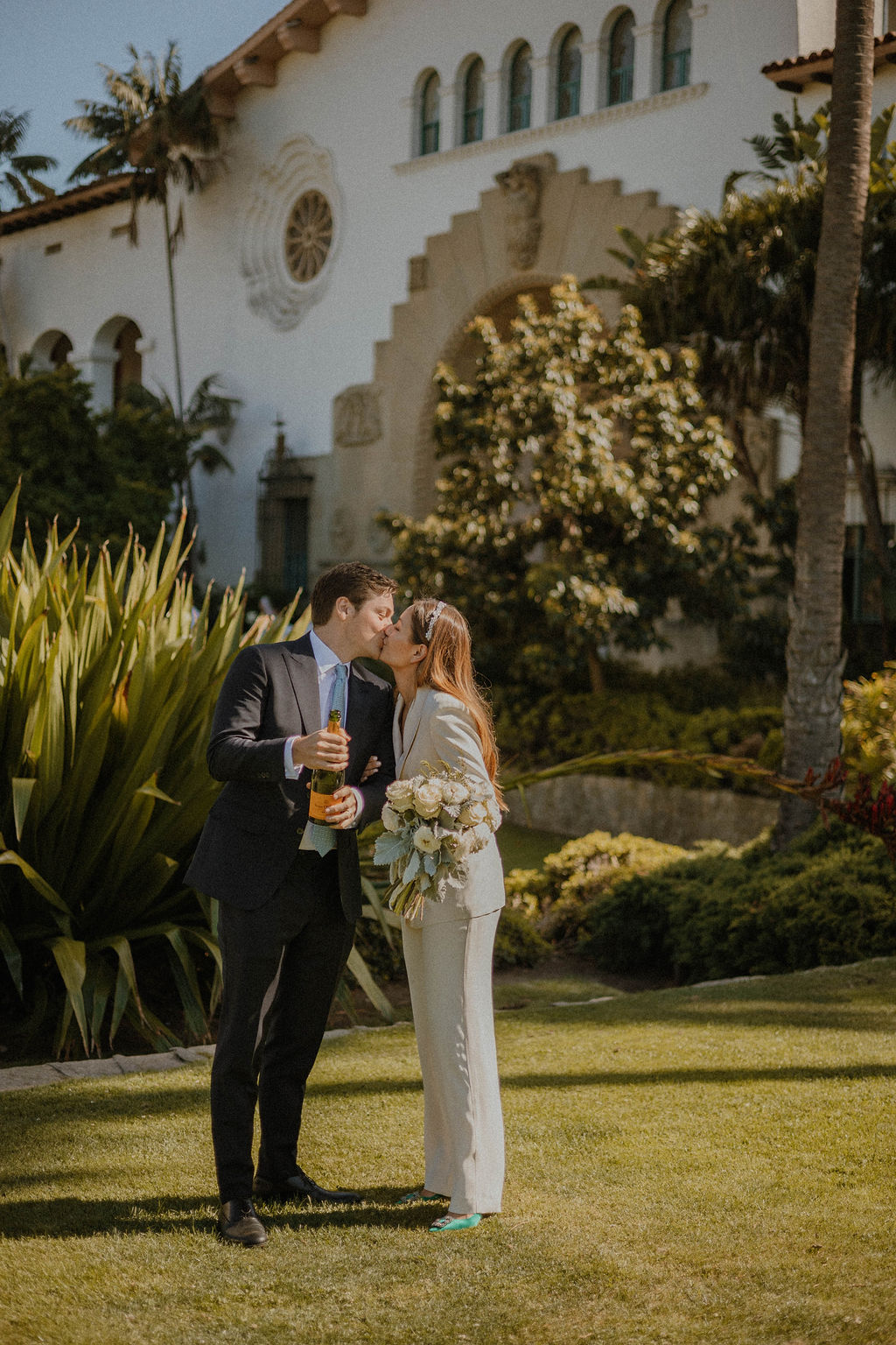 the couple kissing after their Santa Barbara Courthouse Wedding