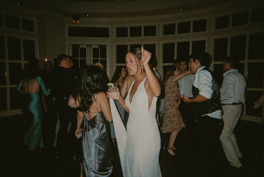 the bride dancing on the dance floor during the reception